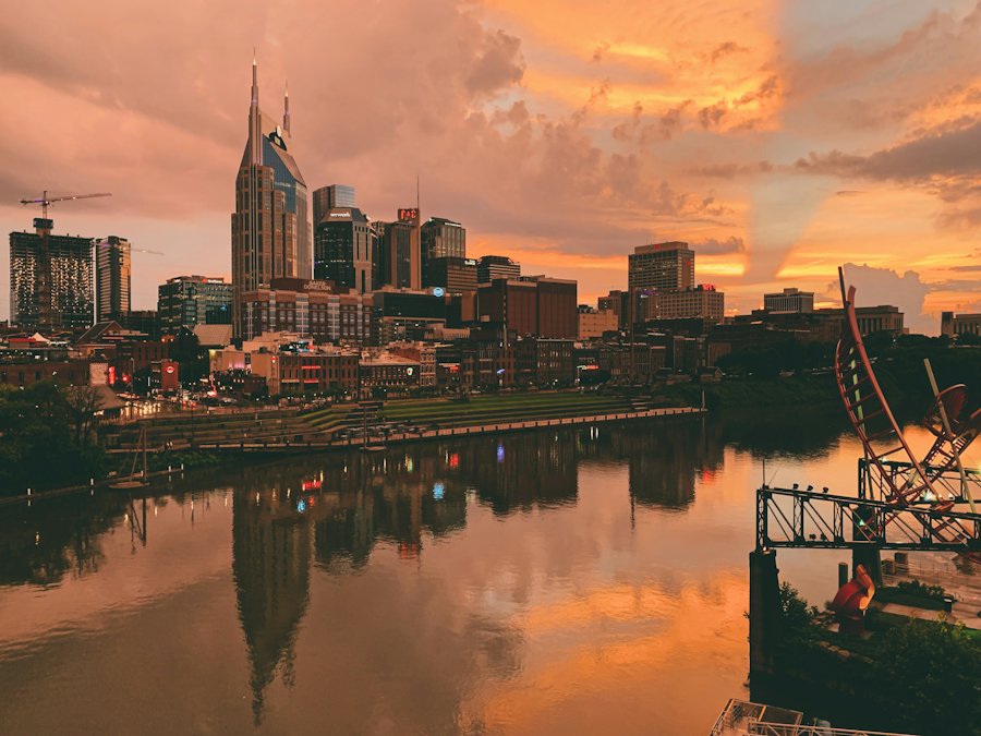 Nashville skyline over the Cumberland River at sunset